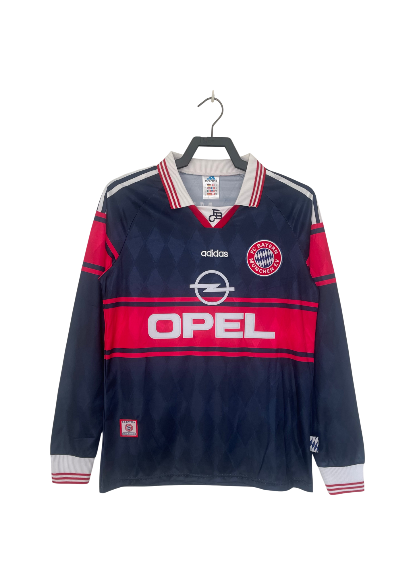 Navy and red sports jersey with Opel and Adidas logos on a hanger against a white background