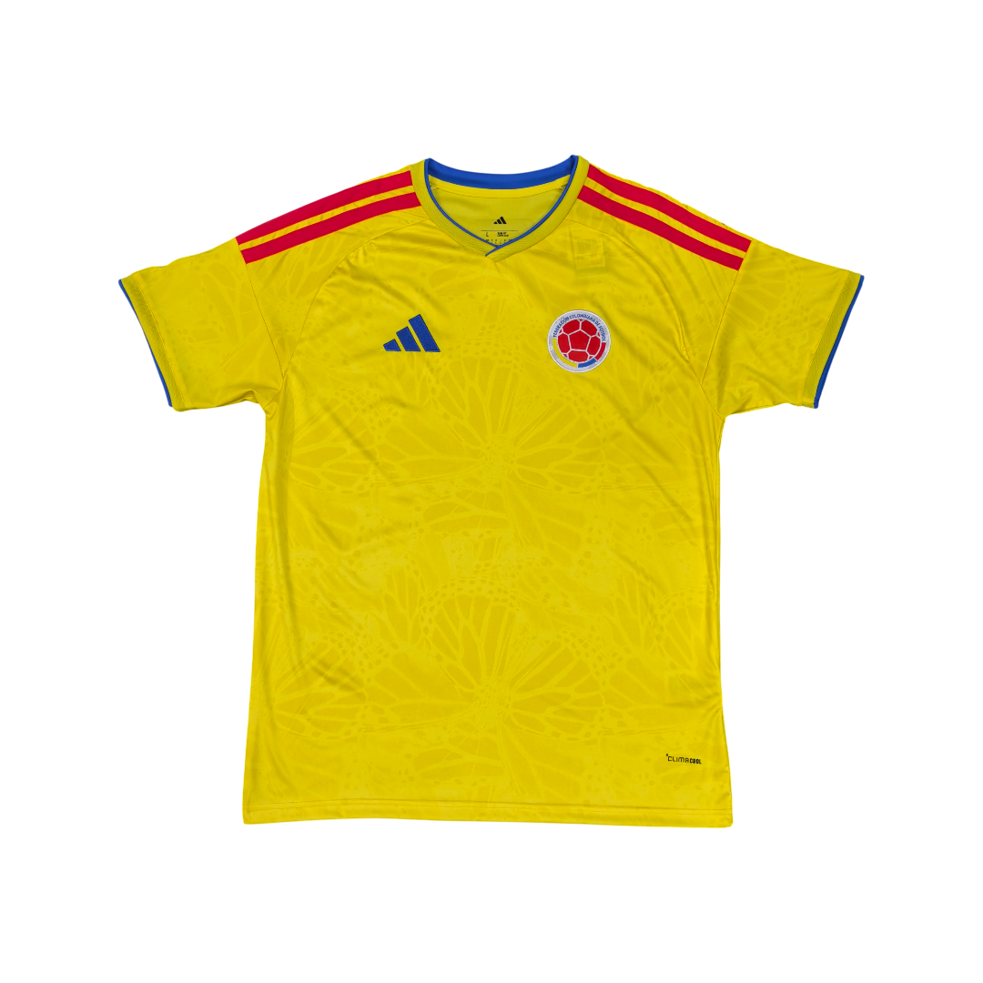 Yellow sports jersey with red stripes and a logo on a white background