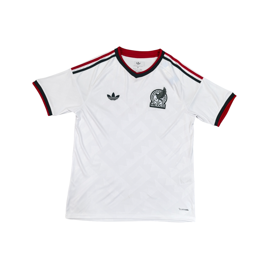 White t-shirt with red and black accents and Adidas logo on a white background