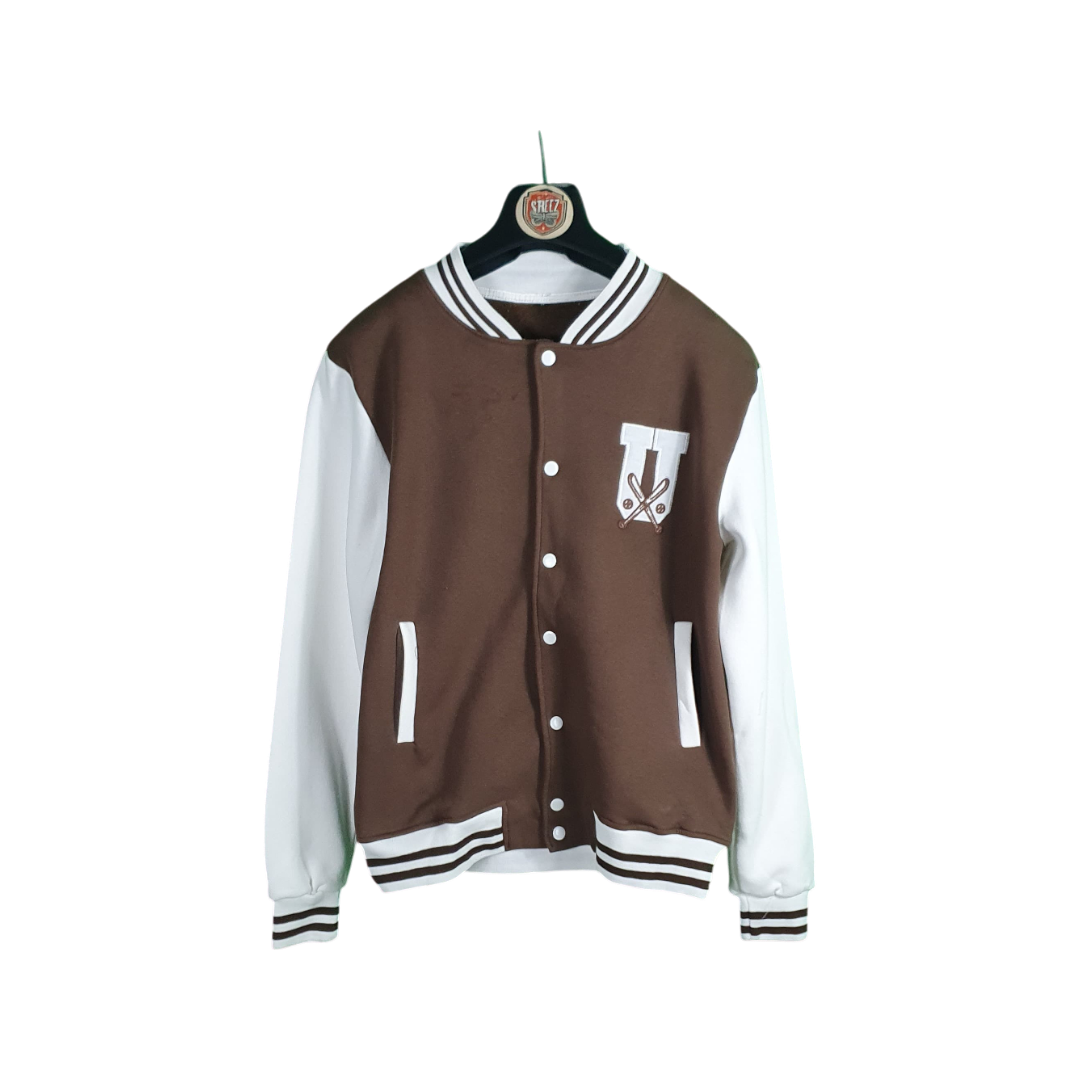 Brown and white varsity jacket on a hanger against a white background