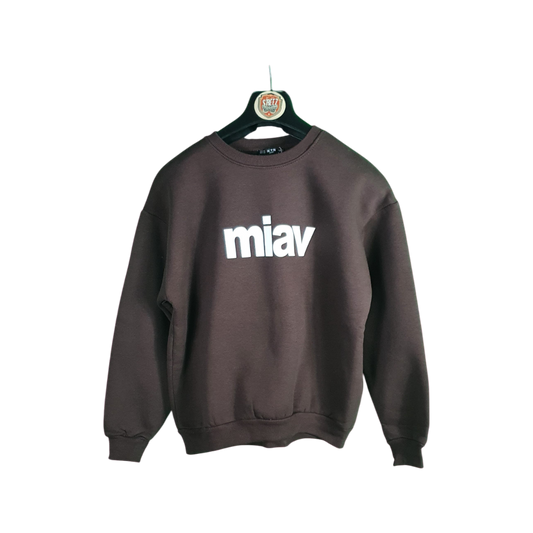 Brown sweatshirt with 'miav' logo on a hanger against a white background