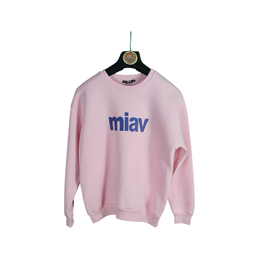 Pink sweatshirt with 'miav' logo on a hanger against a white background