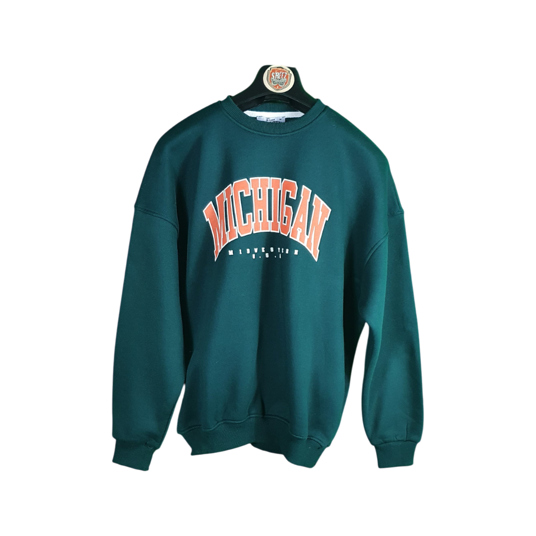 Green sweatshirt with 'Michigan' printed on it, hanging on a white background